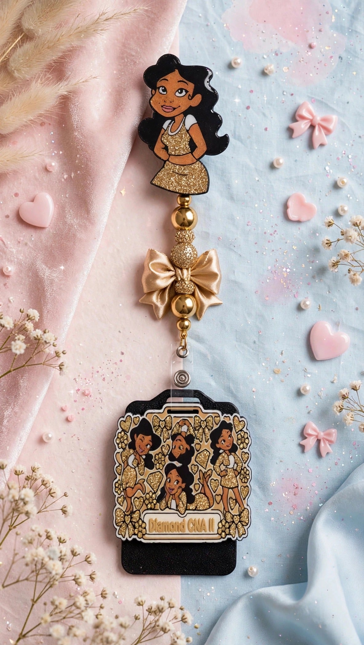 Penny Badge Reel Set in Gold — badge reel, beaded dangle with bow, and personalized badge buddy, styled on blush pink and baby blue