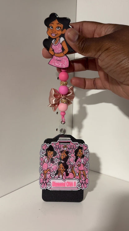 Penny Badge Reel Set in Pink shown in hand with personalized badge buddy